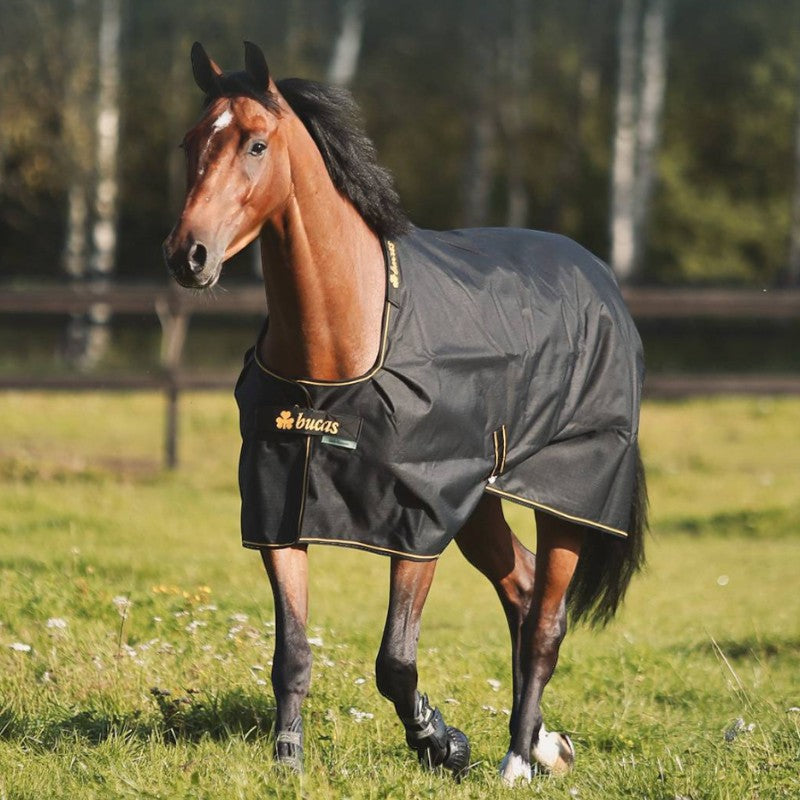 Bucas - Manta de exterior Irish Turnout 300 negro/ gold 300g | - Ohlala